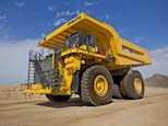 New Electric Dump Truck under cloudy sky